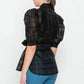 A See-thru Mini Length Organza Top