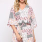 Patchwork Printed Surplice Romper With Waist Tassel Tie And Bottom Lining